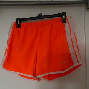 Nike orange running shorts size medium